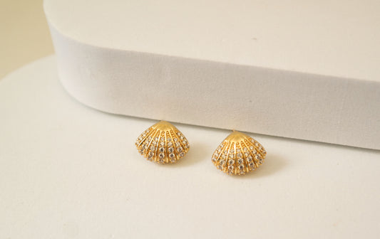 BRINCO SHELL OURO